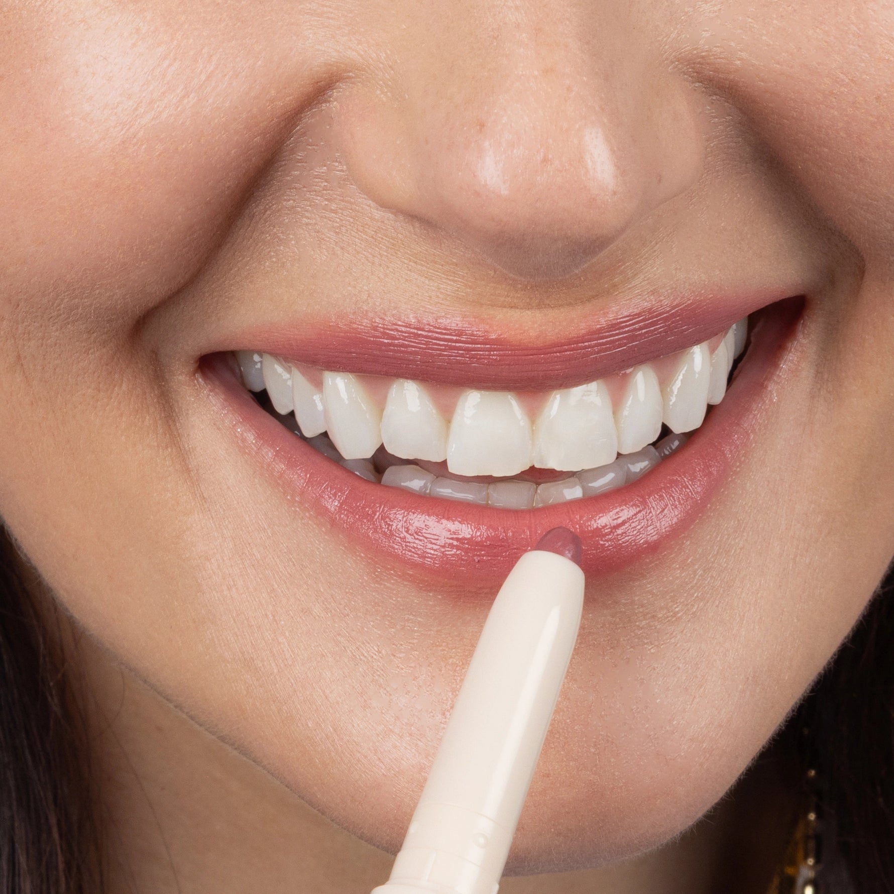 Silky Sculpt in Rose Latte - Model applying lip liner 