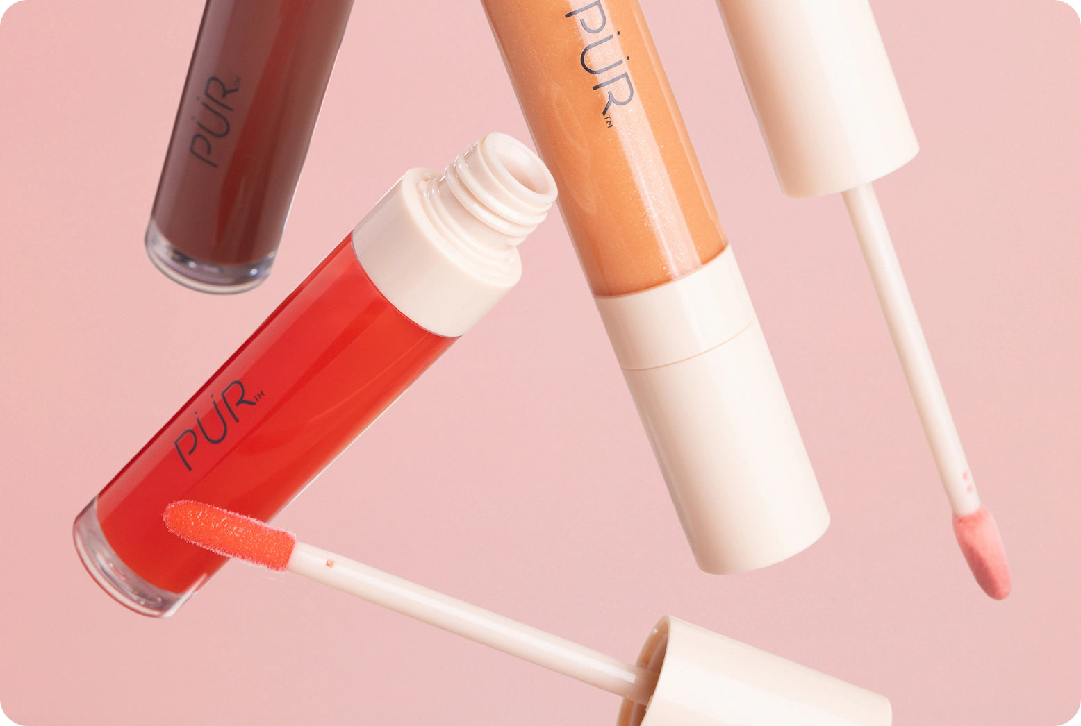 Cherry Blossom Flush - 25% Off Lip and Cheek - Glossy Lip Tint silos falling against pink background
